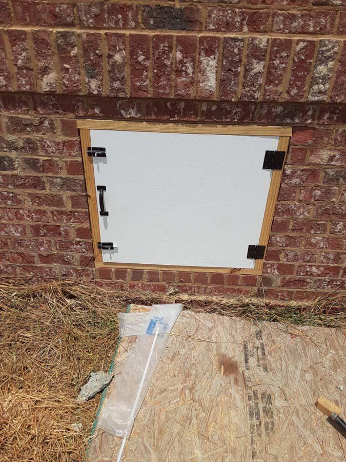 New crawl space access door
