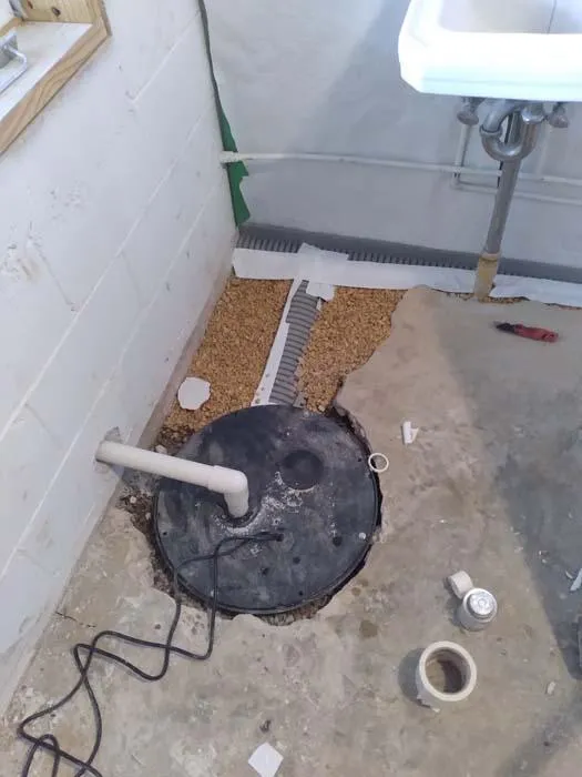 Sump pump and drainage installation